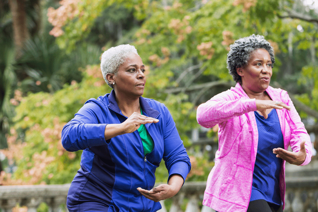 two women doing tai chi, one of the best exercises for obese woman